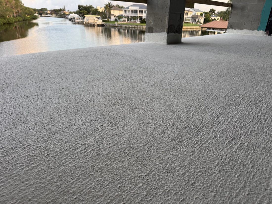 Seamless waterproof membrane across a large waterfront deck